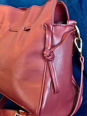Badgley Mischka Mono Wine Color Faux LTHR Bucket Drawstring Crossbody Bag USED